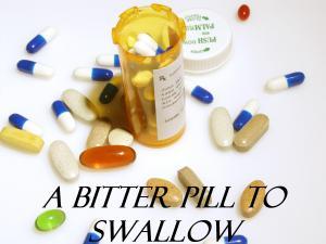 A BITTER PILL TO SWALLOW IDIOM