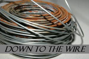 DOWN TO THE WIRE IDIOM